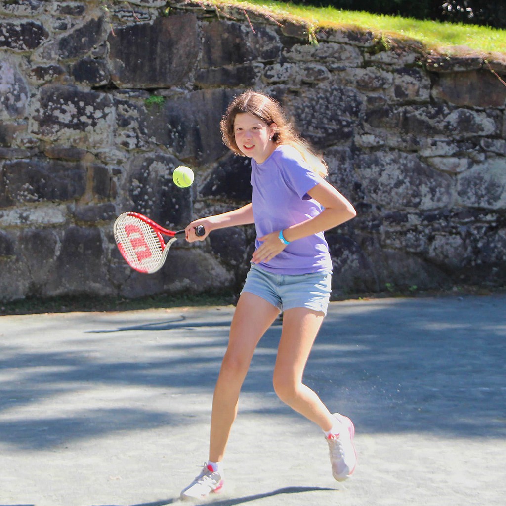 summer camp tennis camper