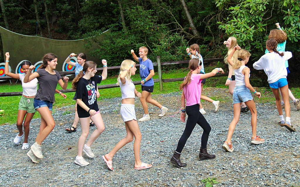 summer camp girls dancing outdoors