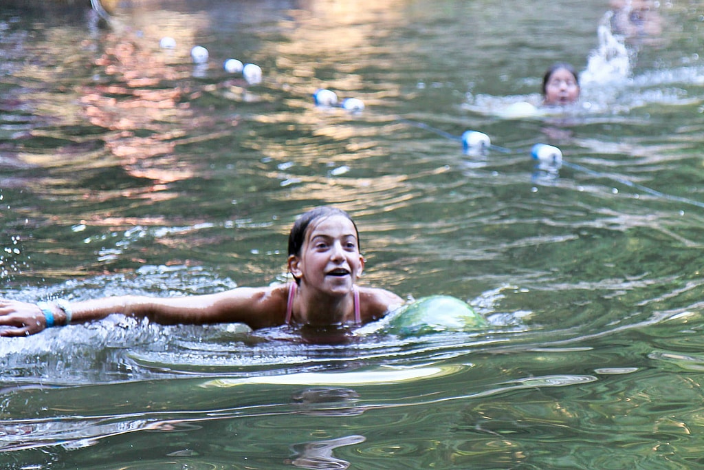 camp greased watermelon swimming relay