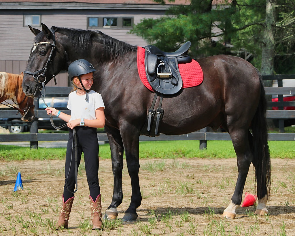 young camp horse rider