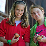 girls eating muffins at summer camp