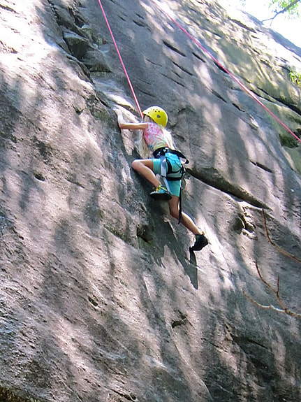 Little kids rock climbing