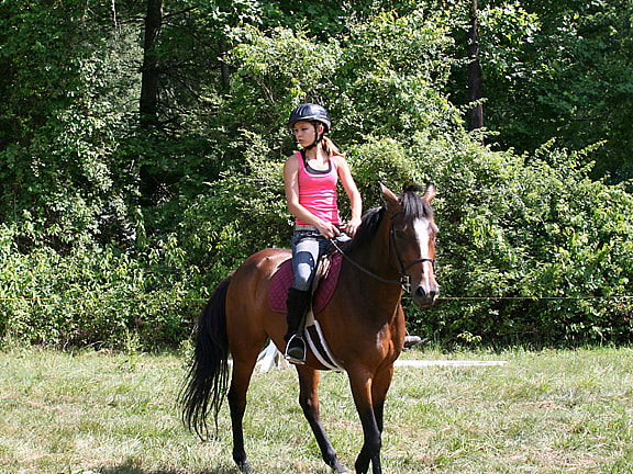 teenager horse riding