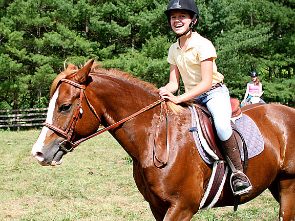 smile young girl riding