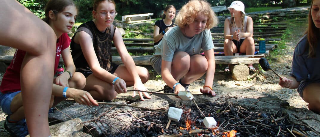 summer camp campfire roasting