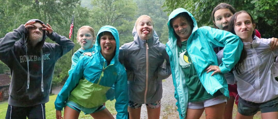 camp kids in the rain