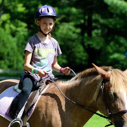 Beginning horseback riding girl