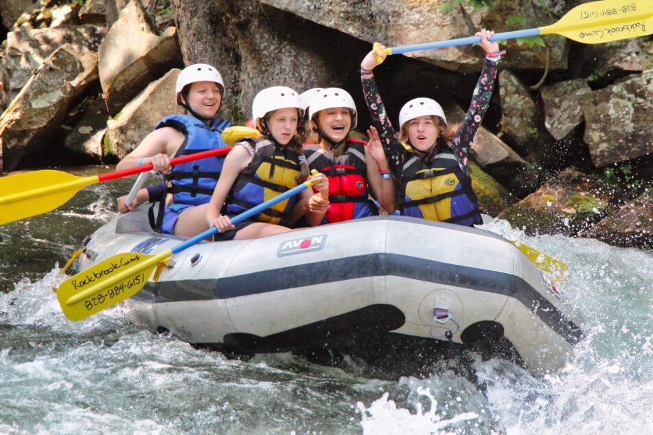 camp girls rafting celebration