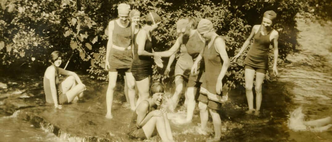 Rockbrook camp girls taking a creek dip