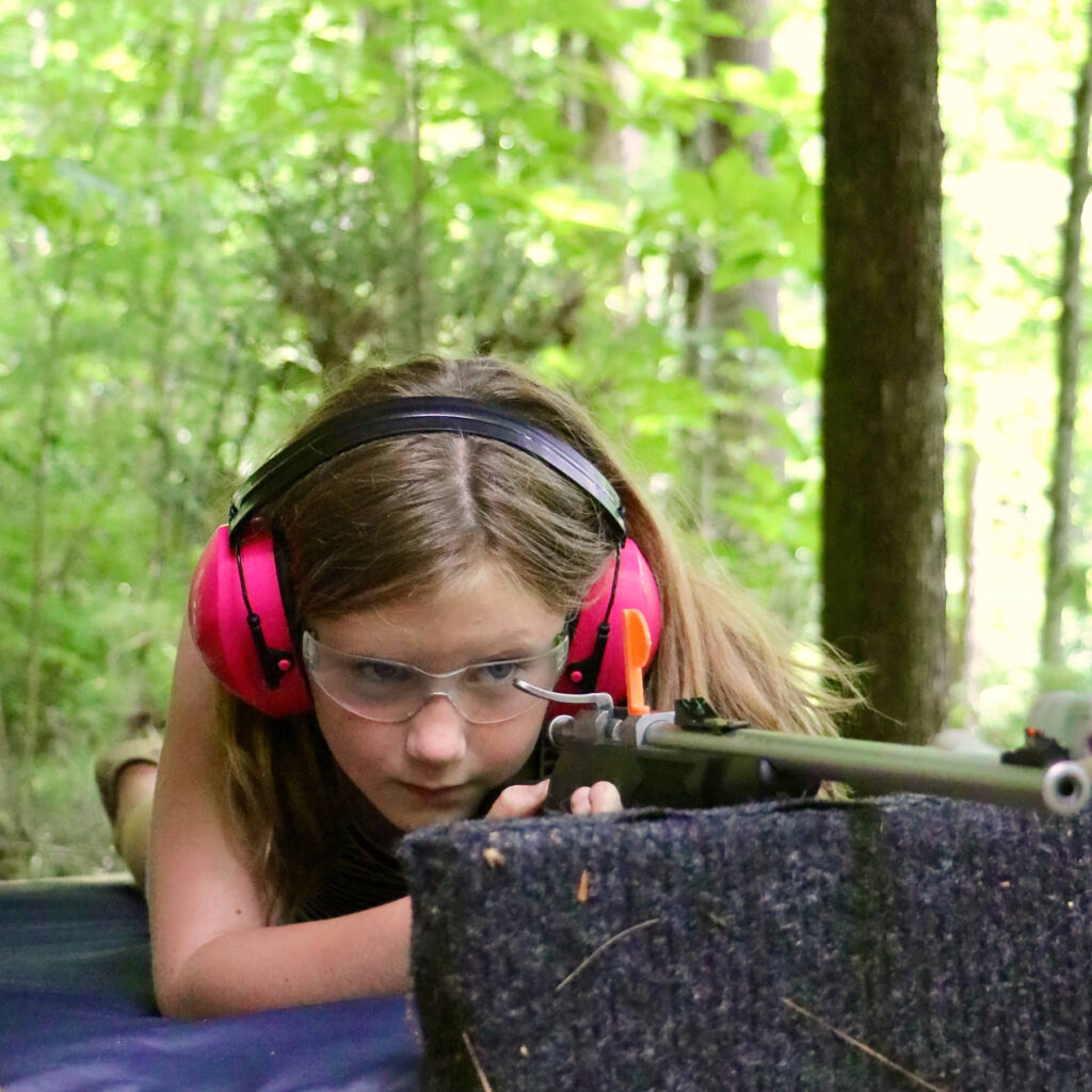 summer camp riflery kid