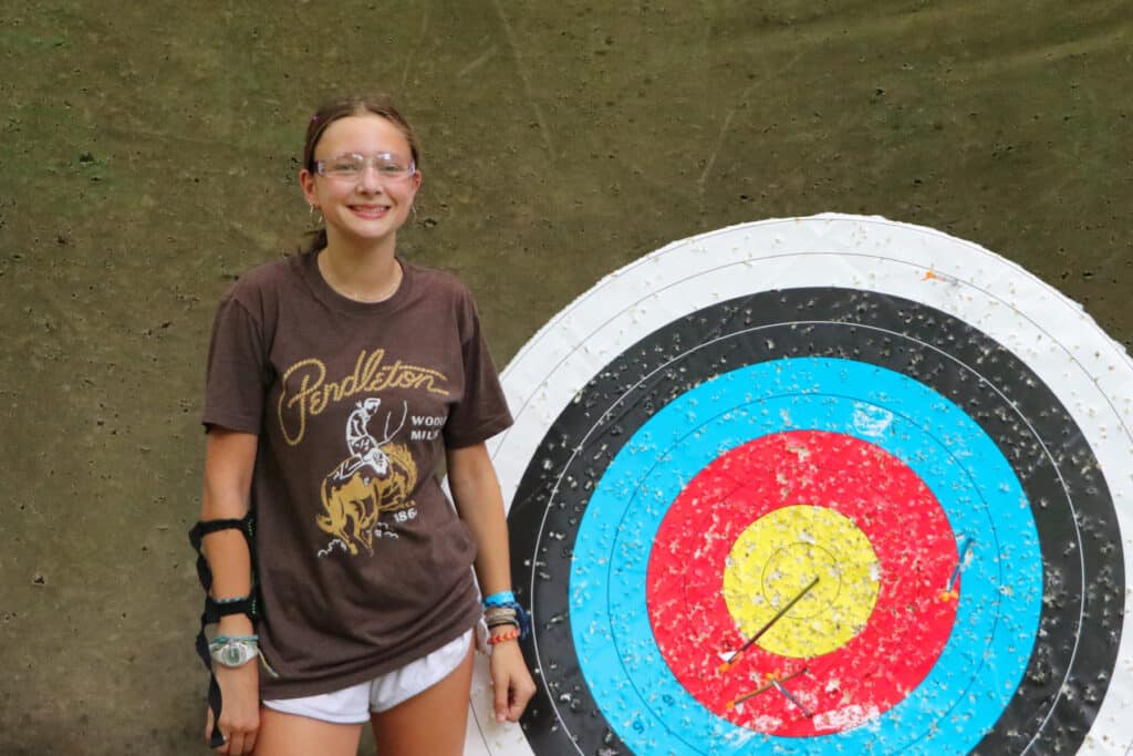 camp archer girl with bullseye