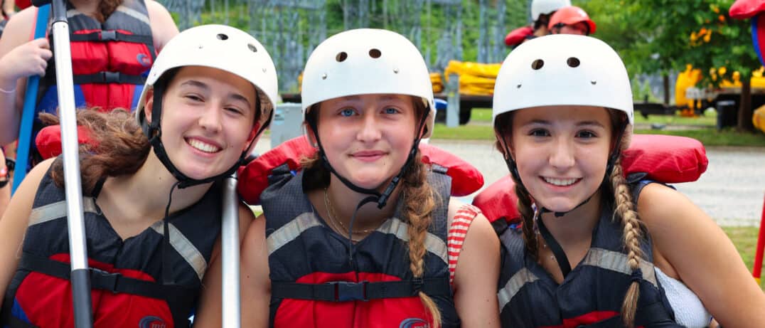 summer camp girls before whitewater rafting